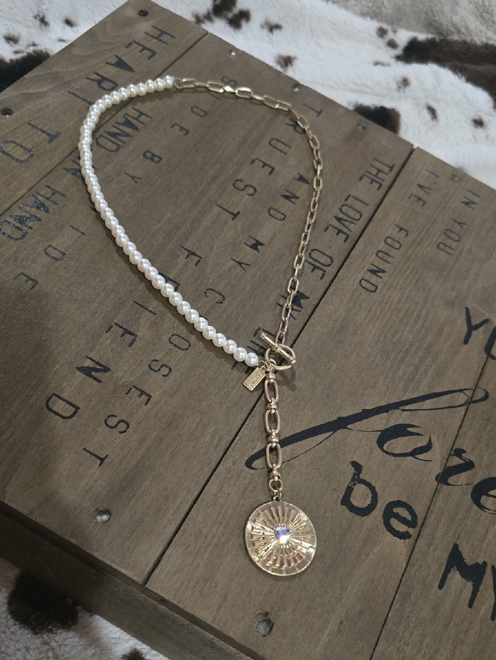 Gold and White Pearl Toggle Necklace with Sunburst Pendant